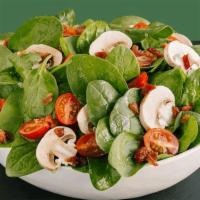 Spinach Salad · Spinach, bacon, mushrooms, grape tomatoes, and croutons. Add cheese for an additional charge.