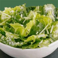 Side Caesar Salad · Romaine lettuce, Parmesan cheese, caesar dressing, and croutons.