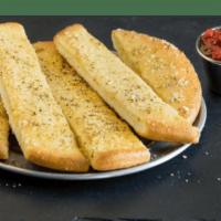 Garlic Butter Breadstix · Our classic pan pizza dough baked to perfection and topped with savory garlic butter and our...