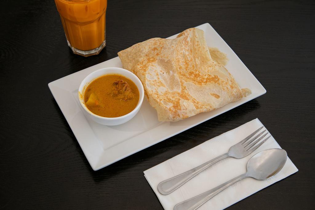 1. Roti Canai · Its the all-time favorite Malaysian crispy Indian style pancake. Served with curry chicken as a dipping sauce. Spicy.