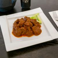 77. Curry Beef Rendang · Spicy.