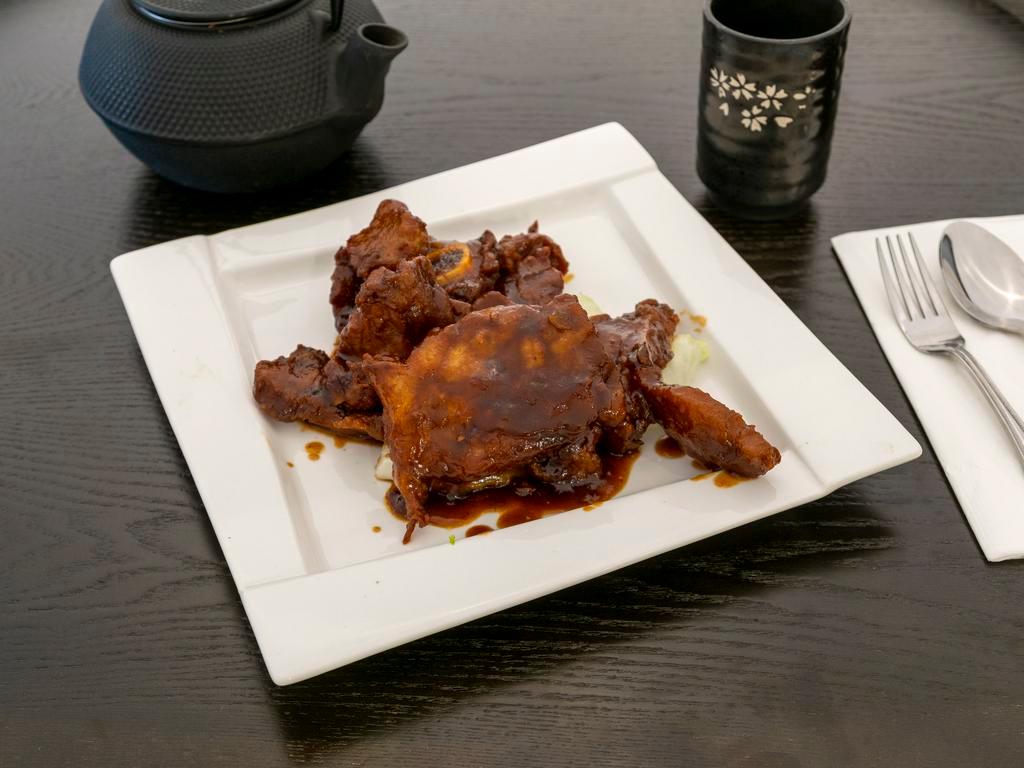 101. Malaysian Pork Chop · Deep-fried pork chop in an authentic BBQ sauce.