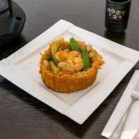125. Sarang Burong · Shaped fried taro stuffed with shrimp, chicken, corn, snow peas and black mushroom topped wi...