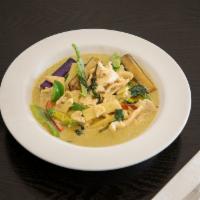 136. Thai Green Curry · Choice of chicken or beef with Thai eggplant, peppers, bamboo shoots, basil and lime leaves ...