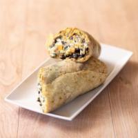 Chile Relleno Burrito · Pasilla pepper filled with cheese and dipped in a light egg batter, wrapped in a flour torti...