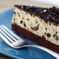 Oreo Mousse Cake · Our oreo mousse cake flavored with melted chocolate, cocoa powder, with layers of rich oreo ...