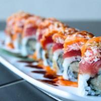 Snow Mountain Roll · Yellowtail roll topped with tuna and crabmeat, drizzled spicy mayo and eel sauce
