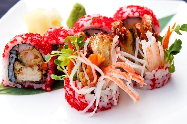 No Problem Roll · Soft shell crab, shrimp tempura, eel, crabmeat, avocado, radish sprouts, burdock and flying fish eggs
