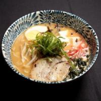 Tempura Udon Noodles · Traditional Japanese noodles, inari, shiitake mushrooms serve with shrimp and vegetable temp...