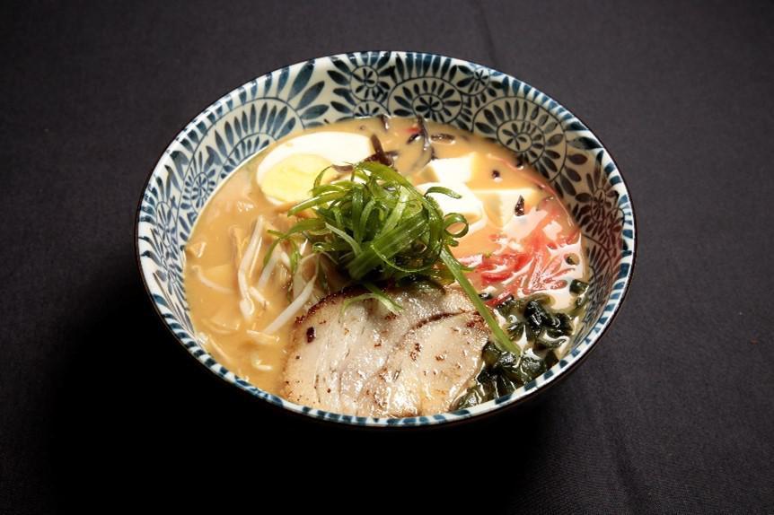 Tempura Udon Noodles · Traditional Japanese noodles, inari, shiitake mushrooms serve with shrimp and vegetable tempura.