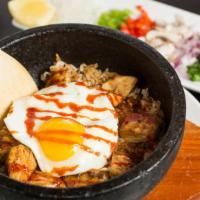 Hot Stone Bowl · Sizzling rice, sunny side up egg, fresh vegetables and Katana signature spicy sauce.