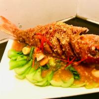 Ocean Spice (Red Snapper) · Fried whole red snapper topped with sweet spicy chili sauce. Spicy.