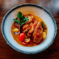 Duck Curry · Roasted duck, bamboo, bell pepper, green long hot chili, string beans, eggplants and basil s...