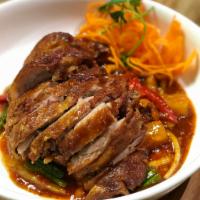Duck Lover · Crispy duck in spicy sweet pepper sauce, served with pineapple, bell peppers and cashew nuts.