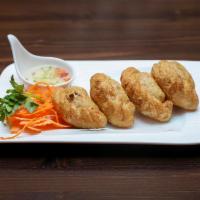 Curry Puff · Combination of chicken, potatoes and onion with yellow curry powder in a puff pastry serve w...