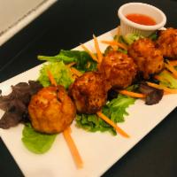 Fried Shrimp and Chicken Dumpling · Great homemade style appetizer with mix of ground chicken and shrimp wrapped in yellow wonto...