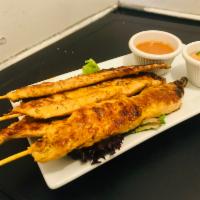 Chicken Satay · Grilled chicken in Thai herb on skewers served with peanut sauce.