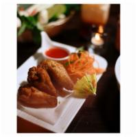 Ace's Chicken Wing · Crispy fried special marinated wings served with Thai Sriracha Ace's sauce.