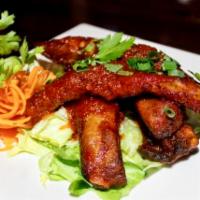 Ace's Sparerib · Special tender marinated spare rib with Ace's sweet chili sauce.