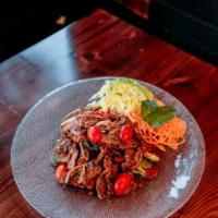 Char-Grilled Beef Salad · Marinated grilled sirloin beef with herbs, onions, scallions, fresh mint, tomato, cucumber, ...