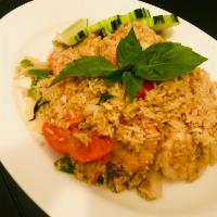 Spicy Basil Fried Rice · Fried rice with egg, onions and red bell peppers in spicy basil soy sauce. Spicy.