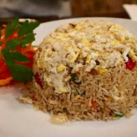 Crab Meat Fried Rice · Fried rice with fresh crab meat, tomatoes, onions, scallions and egg.