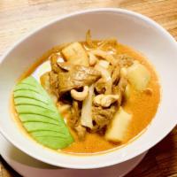 Massaman Curry · Southern Thai curry. Yummy and less spicy with onions potatoes and cashew nuts. Spicy.