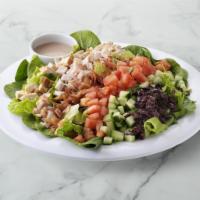 Mediterranean Salad · Romaine, spinach, chicken, turkey, nitrate-free bacon, grape tomatoes, cucumber, and Kalamat...