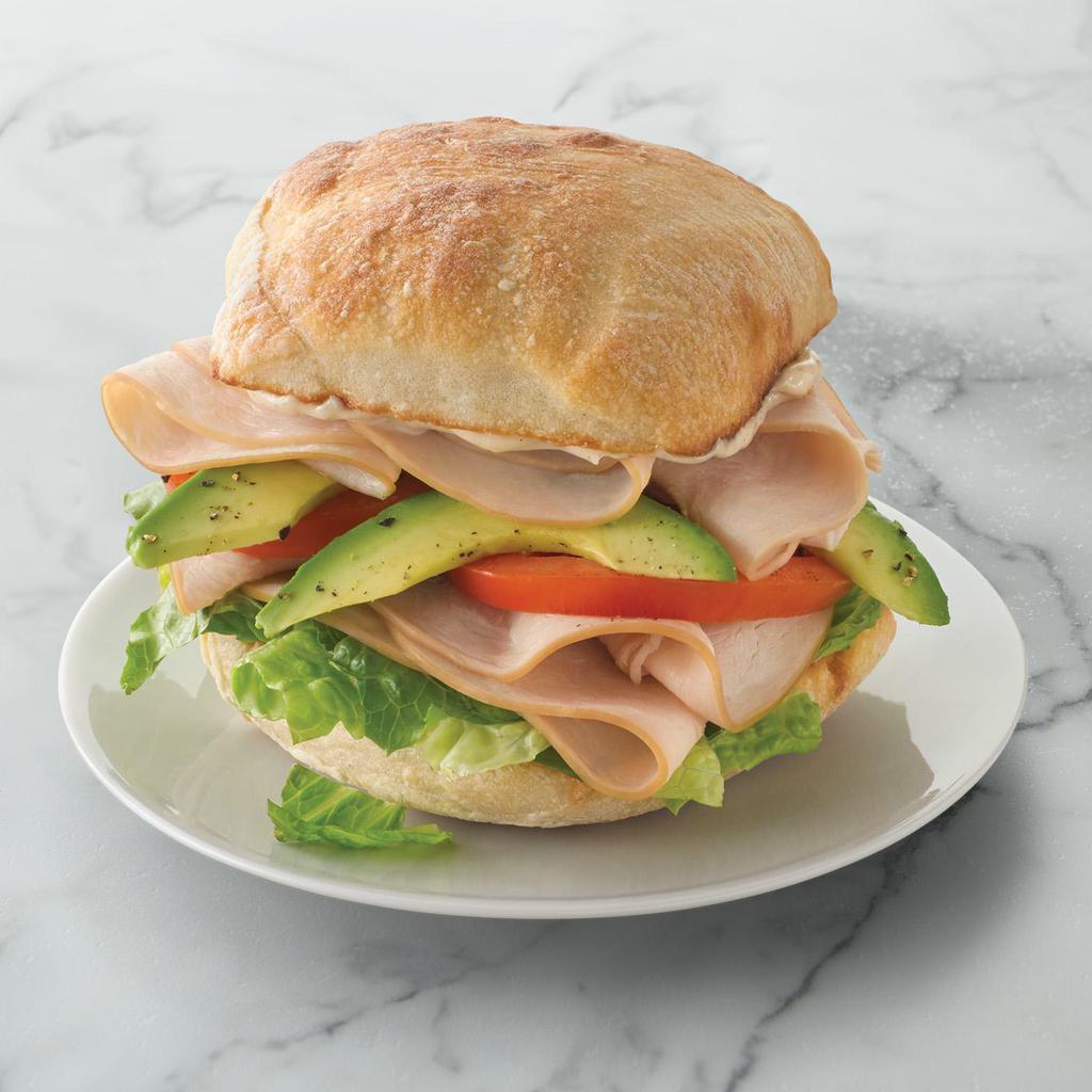Turkey Avocado Sandwich · Turkey, romaine, avocado, and tomato with house-made black pepper mayo on toasted ciabatta. (690 cal) 33g Protein	60g Carb	36g Fat		6g Fiber 