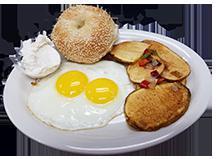 2 Eggs Any Style · Any style. Served with choice of side and bagel with plain cream cheese.