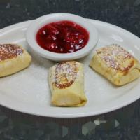 Cheese Blintzes Breakfast Special · Served with sour cream or applesauce. Add blueberry or strawberry compote for an additional ...