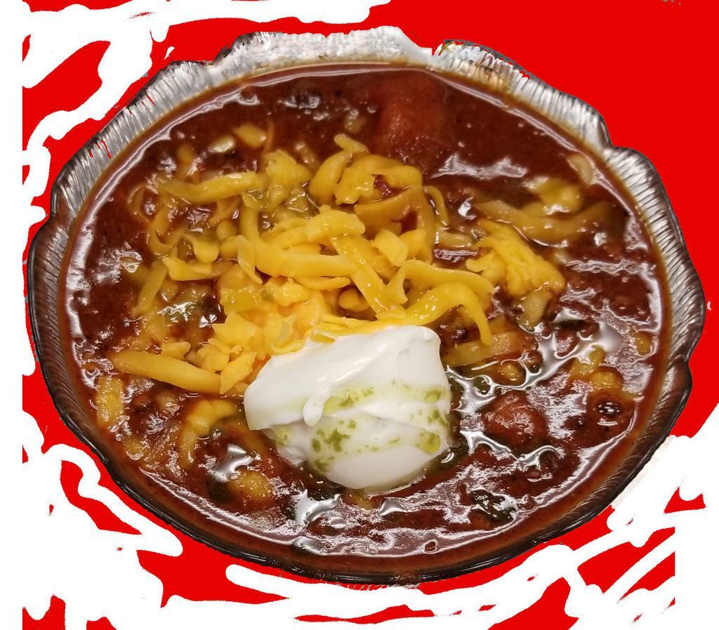 Chili Soup · House-made chili con carne topped with cheese and onions.
