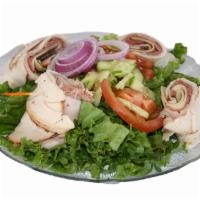 Chef's Salad · Ham, turkey, roast beef and Swiss on a bed of fresh greens with tomato, onion and cucumber. 