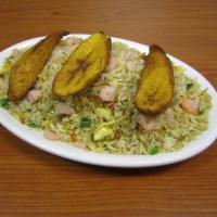 Cuban Arroz Frito con Camarones · Cuban chicken and shrimp fried rice with plantains. 