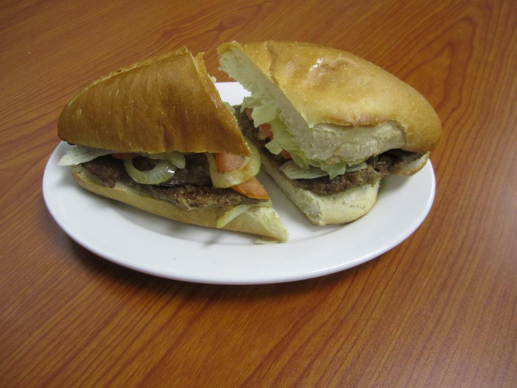 Cuban Pan con Bistec · Steak sandwich. 