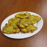 Tostones · Twice fried plantains. 