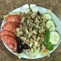 Greek Chicken Salad · Served with chicken with lettuce, tomatoes, onions, cucumbers, green pepper, feta cheese and...