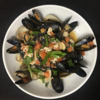 Black Squid Ink Linguini · mussels, clams, crabmeat, tomatoes, capers, spicy tomato sauce
