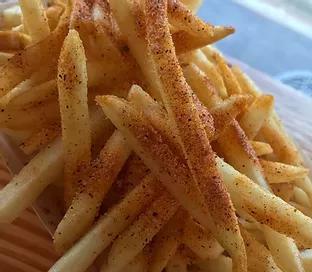 Cajun Fries · Thin fries topped off with our house Cajun seasoning.