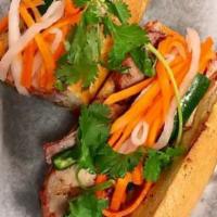 BBQ Pork Sandwich · Thick sliced pork steamed to the style of Chinese BBQ on a toasted French baguette with butt...