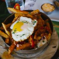 Benedict Fries · Pit smoked ham, fries, peppadew peppers, Swiss cheese, smoked paprika hollandaise sauce and ...