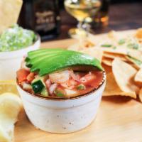 Ceviche & Guacamole · Shrimp Ceviche with Tabasco sauce topped with avocado, served with a side of chips and house...