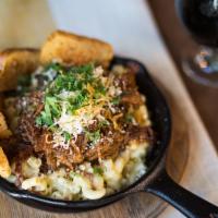 BBQ Pork Mac and Cheese · Beer-braised BBQ pulled pork, cheddar, jack and Parmesan cheeses, bacon bits, peppered garli...