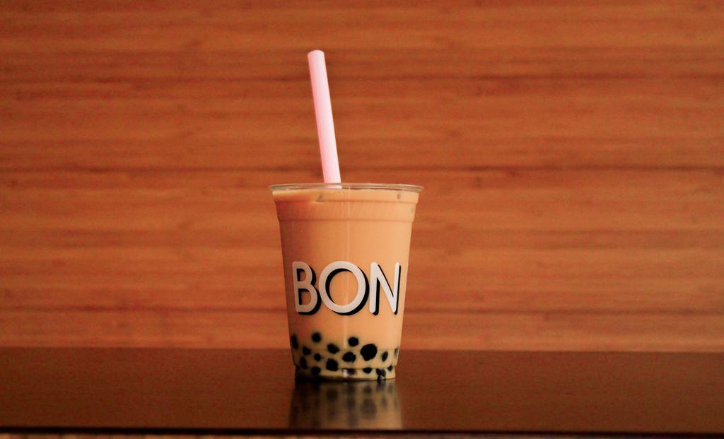 Milk Bubble Tea · contains milk. creamy and sweet iced black tea with tapioca pearls.