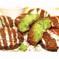 Falafel 6 Piece  · Mixture of crushed chick peas, parsley, garlic, onion and spices. Comes with tahini and hot ...