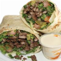 Beef Shawarma Wrap · Thin slices of beef marinated of special spices.