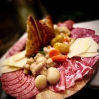 Meat and Cheese · Cured Artisan meats, assorted cheeses, marinated olives, pickled vegetables, crostini.