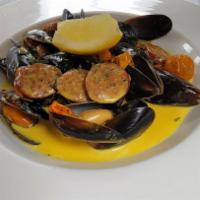 North Shore Saffron Mussels · Chorizo, garlic, mashed tomatoes, saffron cream.