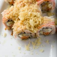 Leon Special Roll · Temp shrimp, snow crab mix, cream cheese, cucumber, topped w/krab stick, crunchies, tsurai, ...