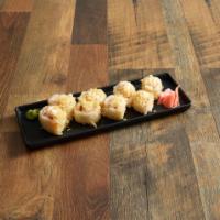 K-Mac Roll · Shrimp tempura and crab sticks inside out wrapped in soy paper and topped with spicy mayo, a...